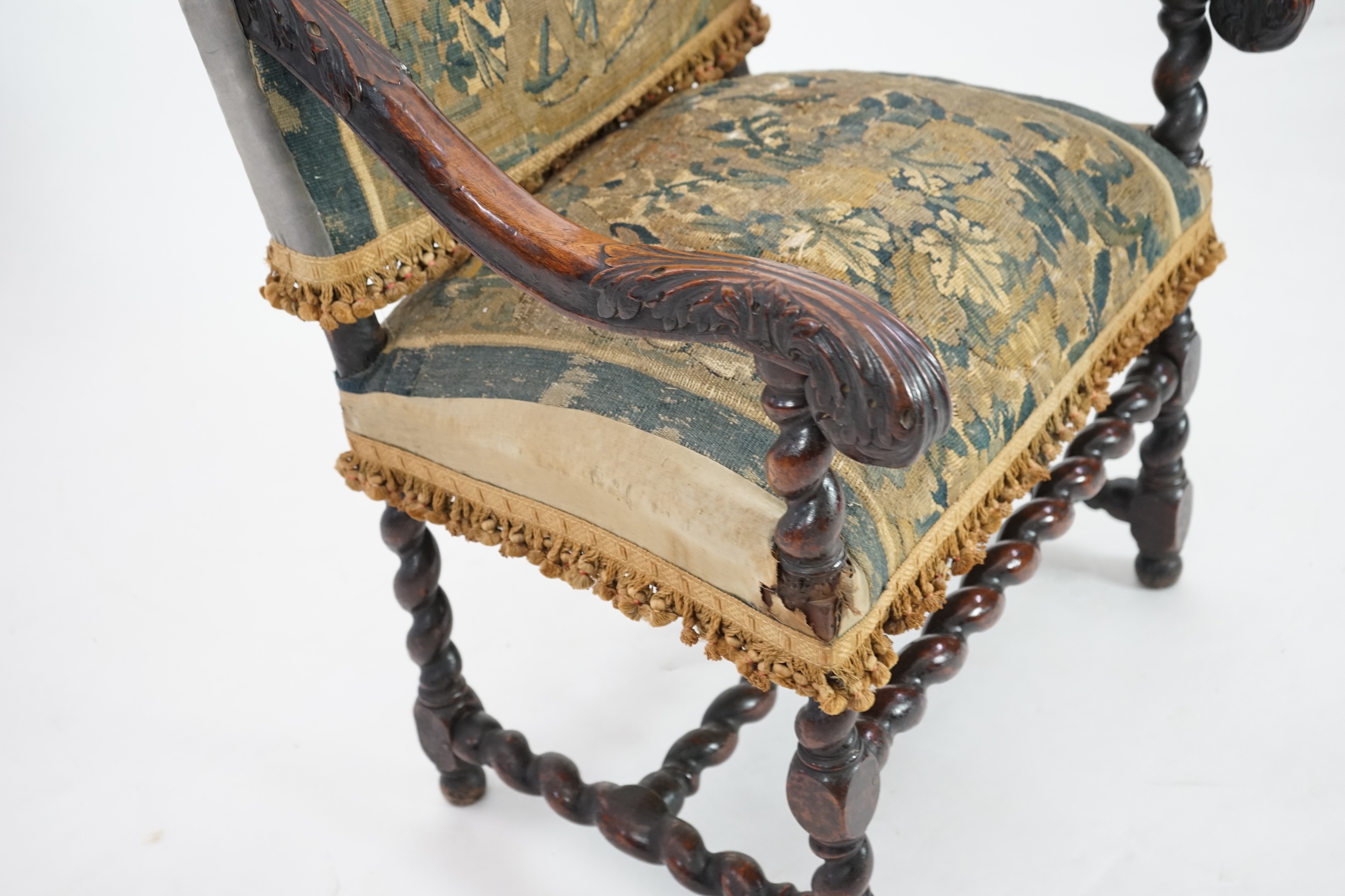 A 17th century French walnut fauteuil